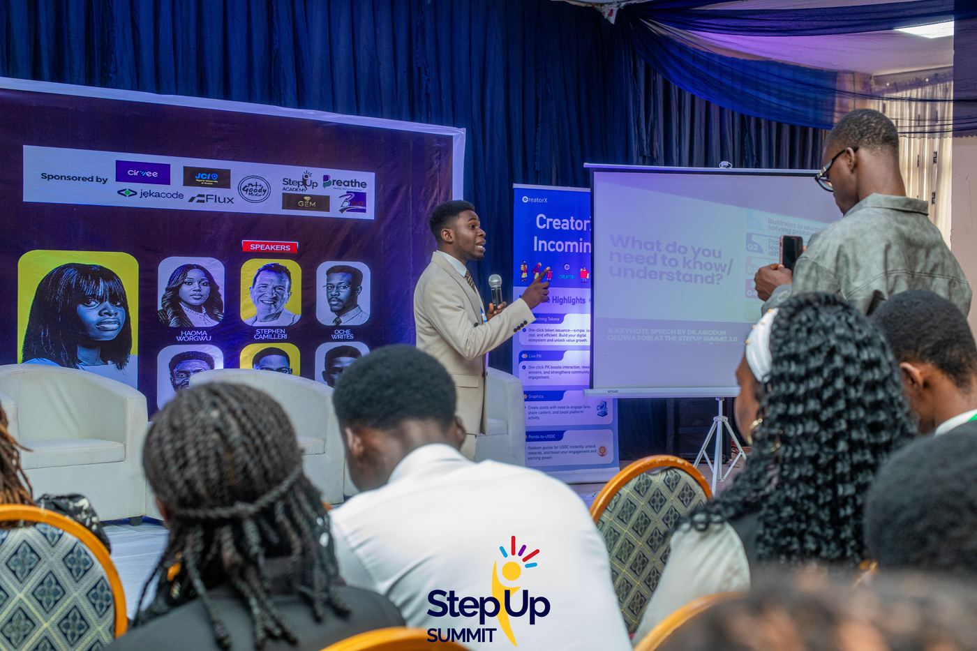 Speaker on stage at Step-Up Summit